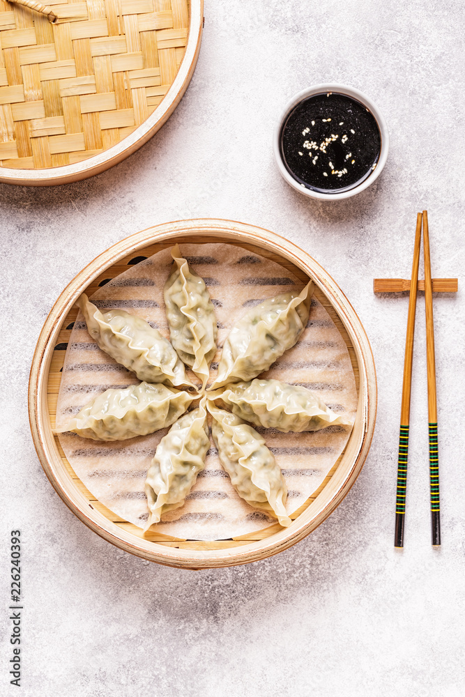 Asian dumplings, soy sauce, chopsticks, top view Asian dumplings, soy sauce, chopsticks, top view