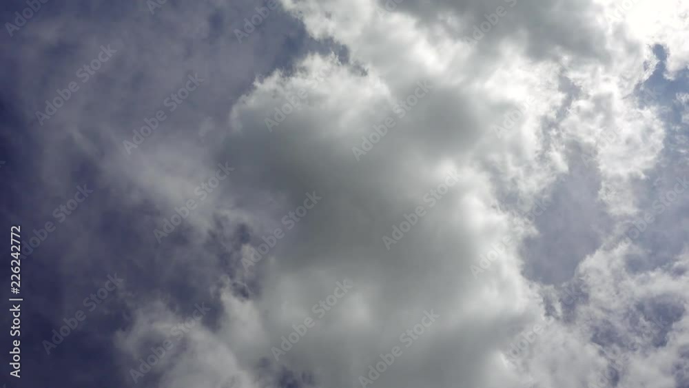 Point of view of the person who looks at the cloudy blue sky and turns. Point of view of the person who looks at the cloudy blue sky and turns.