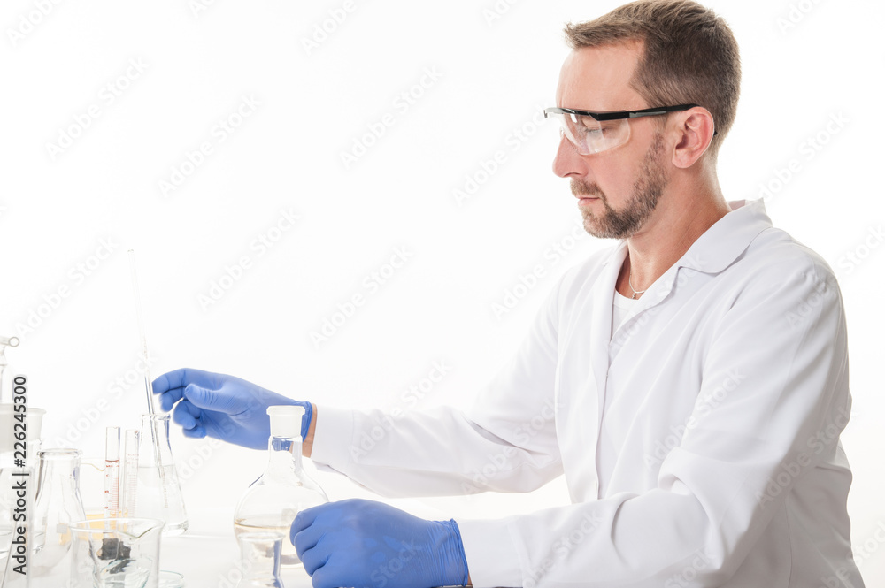 man in the laboratory
view of a man in the laboratory while performing experiments
man in the laboratory
view of a man in the laboratory while performing experiments