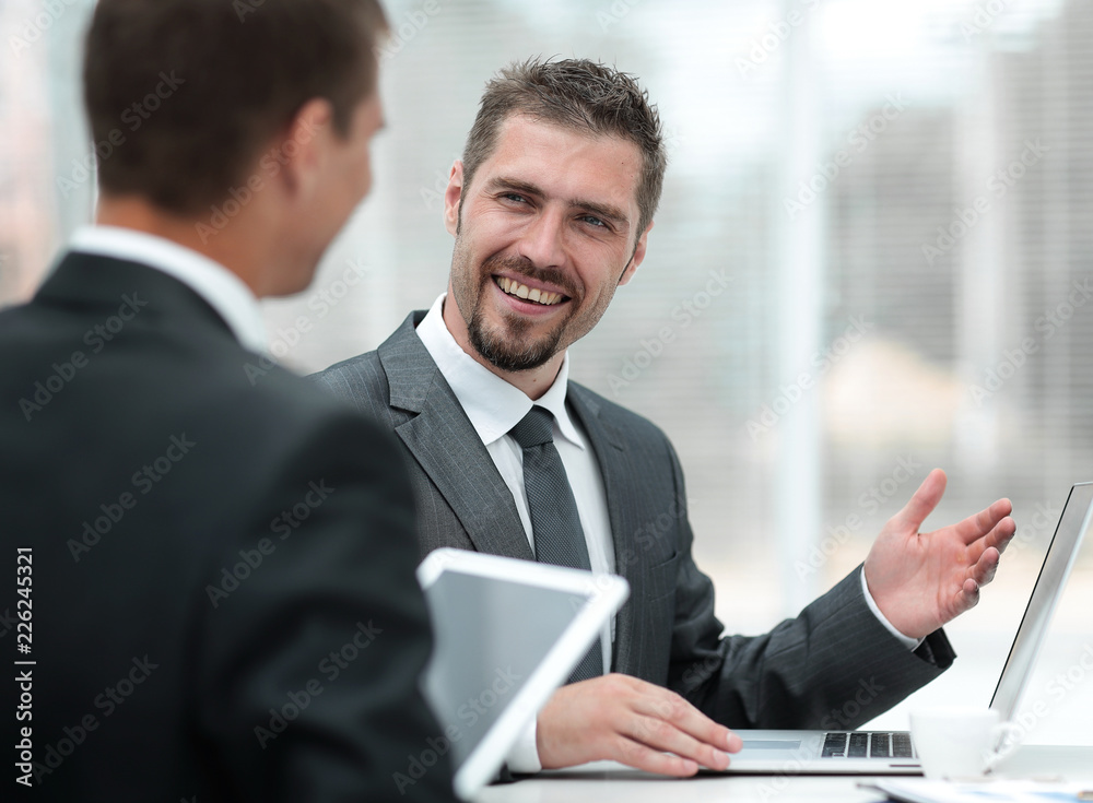 closeup.business partners discussing business issues closeup.business partners discussing business issues
