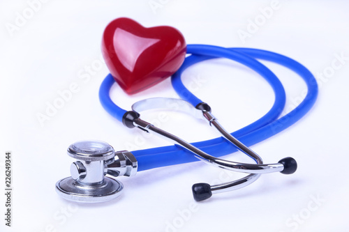 medical stethoscope and red heart isolated on white background. selective focus.