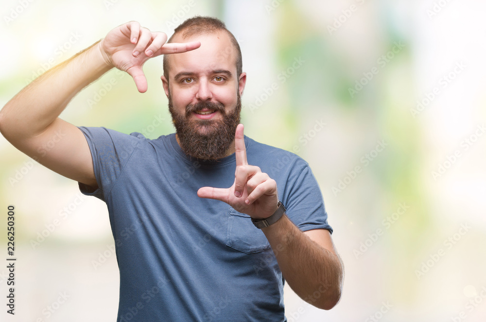 Young caucasian hipster man over isolated background smiling making frame with hands and fingers with happy face. Creativity and photography concept. Young caucasian hipster man over isolated background smiling making frame with hands and fingers with happy face. Creativity and photography concept.
