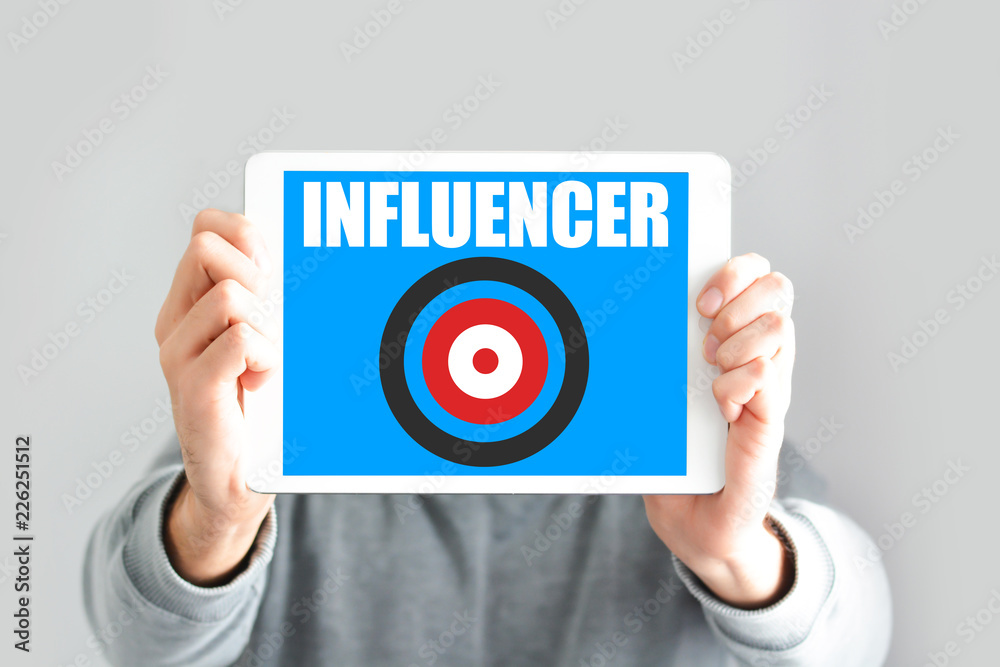 Influencer target concept with young communication specialist holding target on his hands
Influencer target concept with young communication specialist holding target on his hands