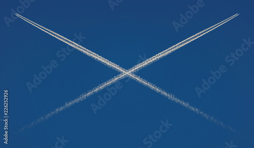 X dans le ciel