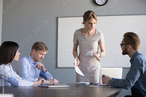 Photos Angry strict executive, female ceo or team leader scolding unprofessional employ