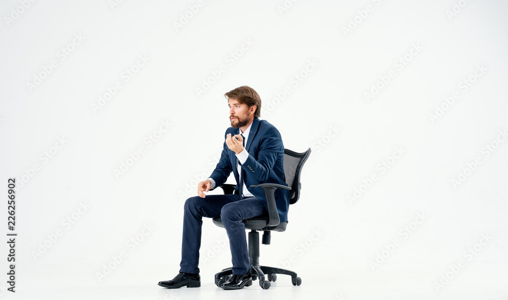 business man sitting on a chair business man sitting on a chair