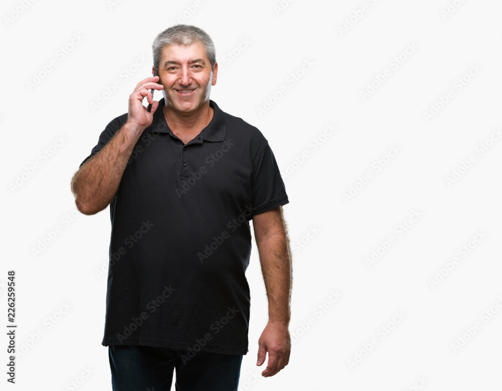 Handsome senior man talking on smartphone over isolated background with a happy face standing and smiling with a confident smile showing teeth Handsome senior man talking on smartphone over isolated background with a happy face standing and smiling with a confident smile showing teeth