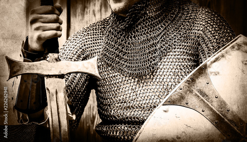 Fotografia Knight man holding sword and shield
