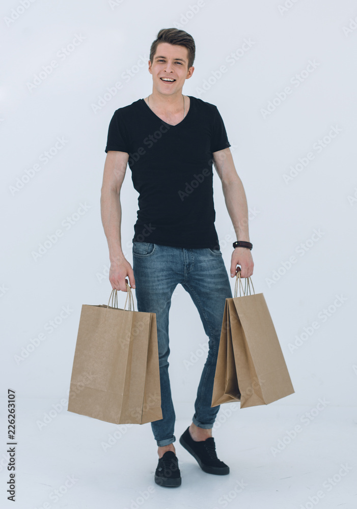 Happy shopping man. Isolated over white background Happy shopping man. Isolated over white background