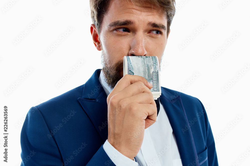 business man thinking with a beard holding money finance business man thinking with a beard holding money finance