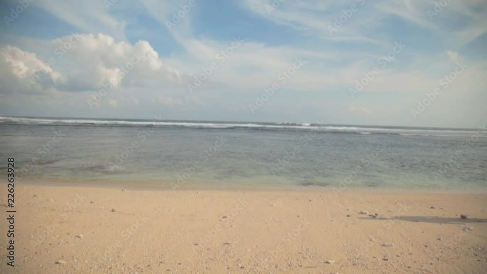 Sportsman running on the empty ocean beach. Sportsman running on the empty ocean beach.