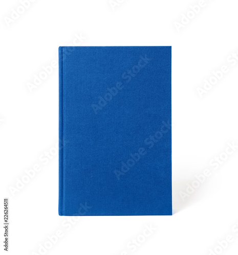 Blue standing hardcover book isolated, front view. Cover made of natural linen fabric with uneven rough texture.