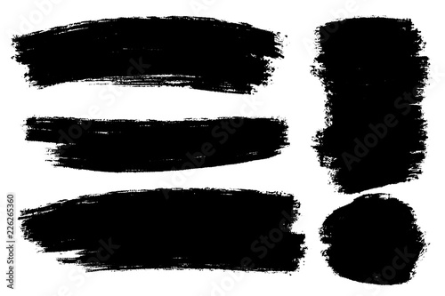 Vector set of hand drawn brush strokes, stains for backdrops. Monochrome design elements set. One color monochrome artistic hand drawn backgrounds.