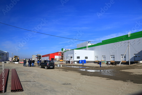 The process of construction and launch of a large logistics center, its internal filling and finishing, the process of formation of the external territory and arrangement of warehouse and office space © FEDORENKO