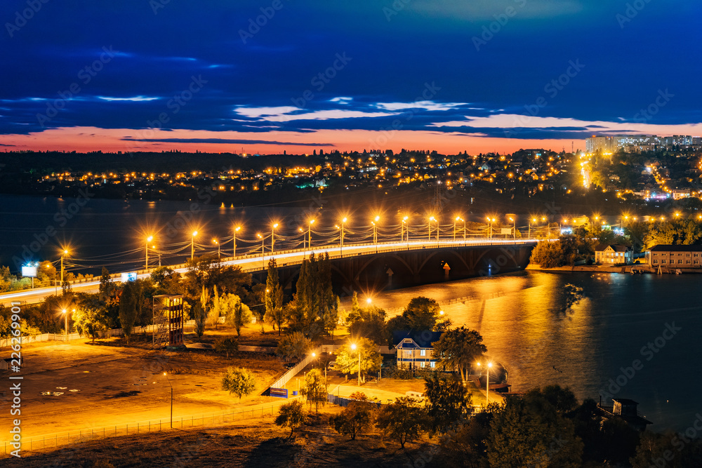 Aerial summer evening Voronezh cityscape from rooftop. View of the bridge over the Voronezh Water Reservoir