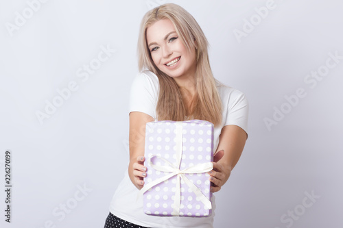 Woman with gift in her hands