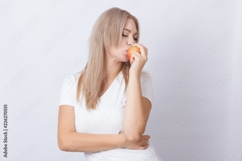 Beautiful blonde woman with apple Beautiful blonde woman with apple
