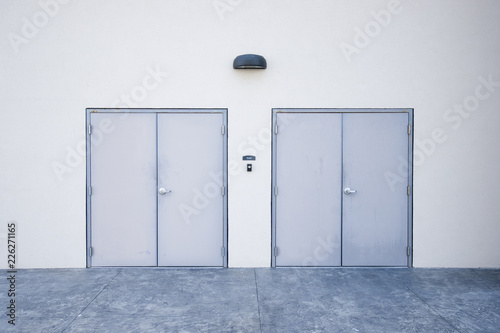 Plakat Symmetrical closed secure doorways