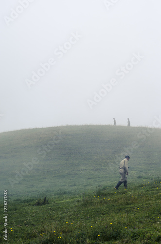man on the hill with fog
