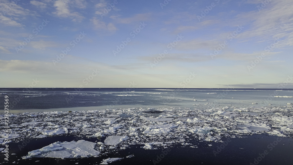 Aerial view over the ice floe edge, Lancaster Sound, northern Baffin Island, Canadian Arctic. Aerial view over the ice floe edge, Lancaster Sound, northern Baffin Island, Canadian Arctic.