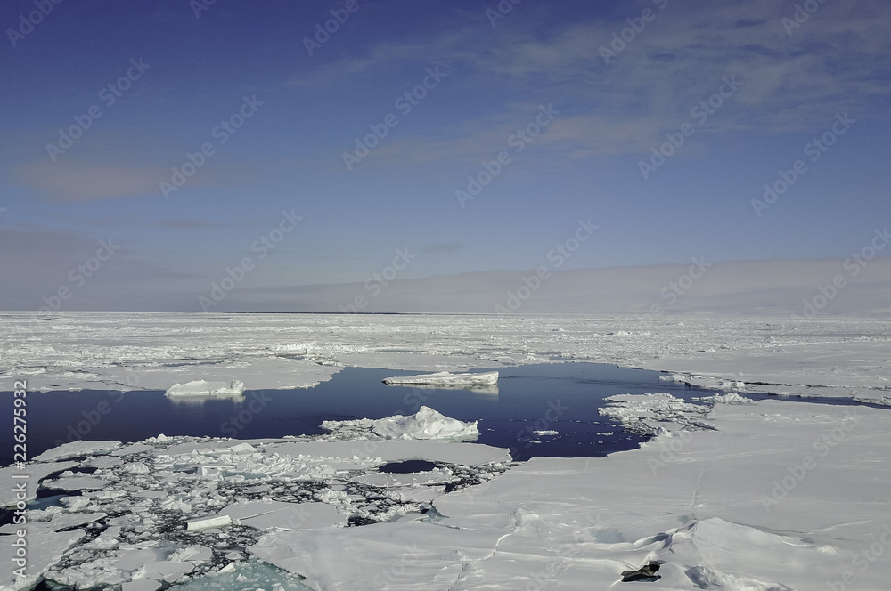 Obraz premium Aerial view over the ice floe edge, Lancaster Sound, northern Baffin Island, Canadian Arctic.