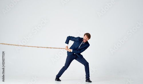 man pulls the rope
