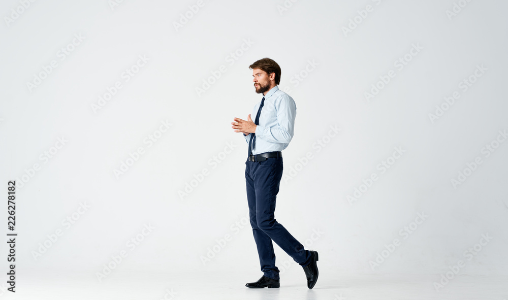 young man goes to the side side view young man goes to the side side view