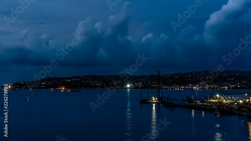 Montego Bay, Jamaica / October 2, 2018 - A cruise ship leaves the port of Montego Bay, Jamaica in the evening.