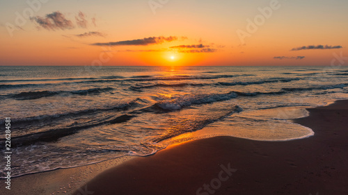 Amazing colorful sunrise at sea © Vastram