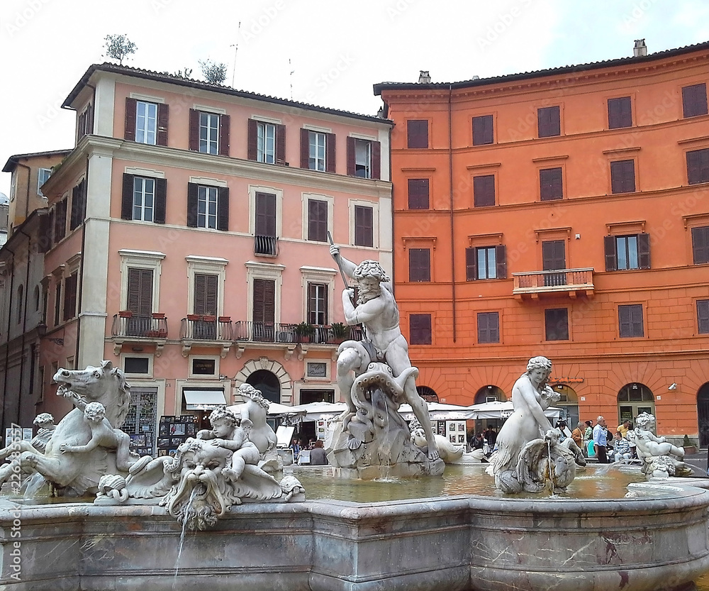 Fountain of Neptune at Piazza Navona. This fountain from 1576 depicts the god Neptune with his trident fight against an octopus and other mythological creatures. Rome, Italy