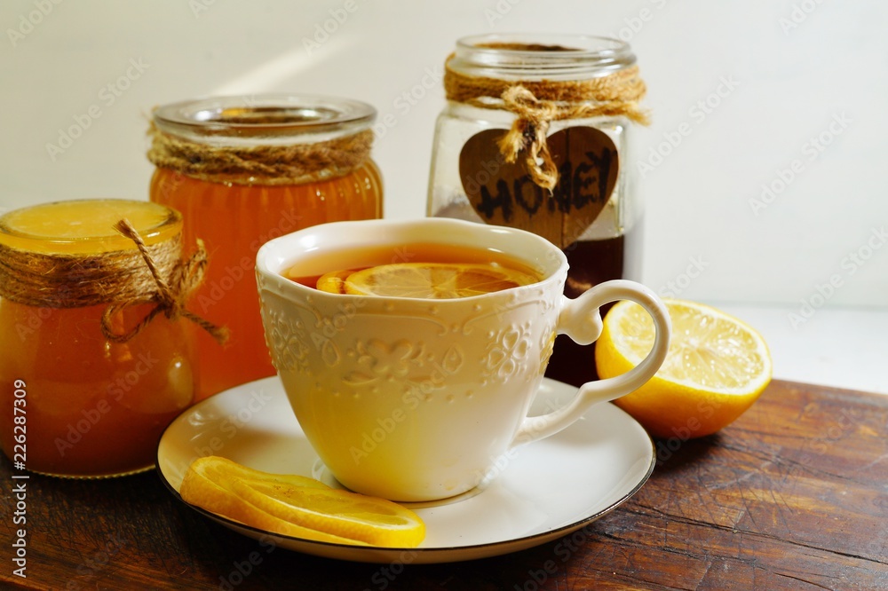Hot tea with spices, honey and syrup - an alternative to antibiotics - selective focus
Hot tea with spices, honey and syrup - an alternative to antibiotics - selective focus