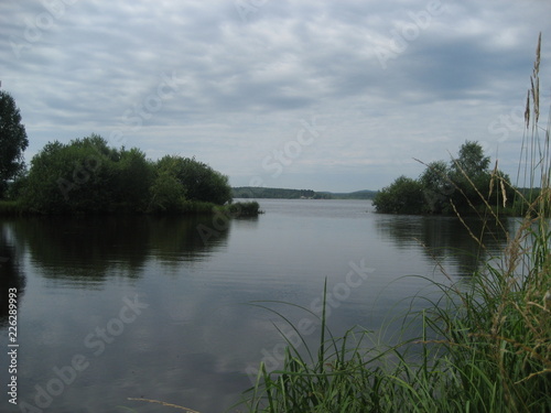 landscape with lake and blue sky