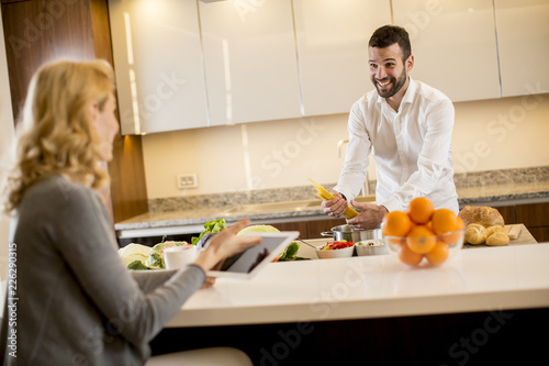 Man preparing a meal while ...
