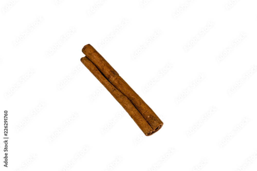 Brown cinnamon stick isolated on a white background Brown cinnamon stick isolated on a white background