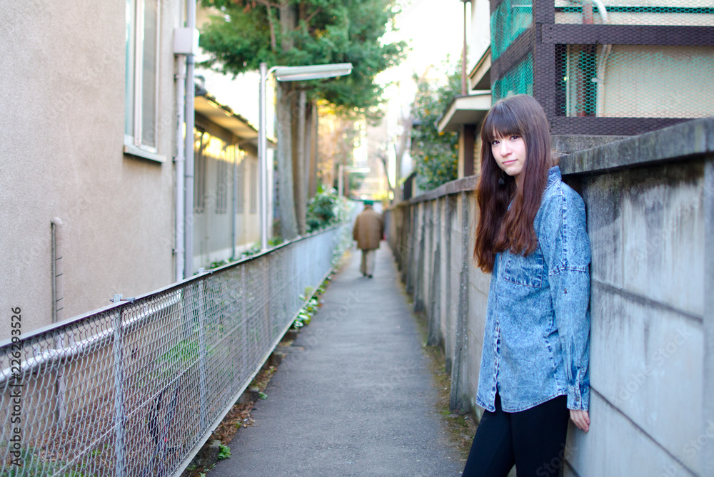 Japanese Girl poses on the street in Kichijoji, Japan. Kichijoji is a Tokyo's No.1 city people want to live.