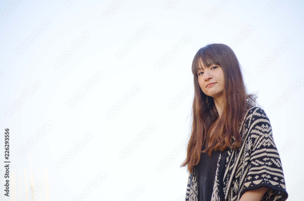 Japanese Girl poses on the street in Kichijoji, Japan. Kichijoji is a Tokyo's No.1 city people want to live. Japanese Girl poses on the street in Kichijoji, Japan. Kichijoji is a Tokyo's No.1 city people want to live.