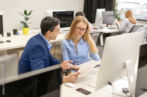 Young people working in off...