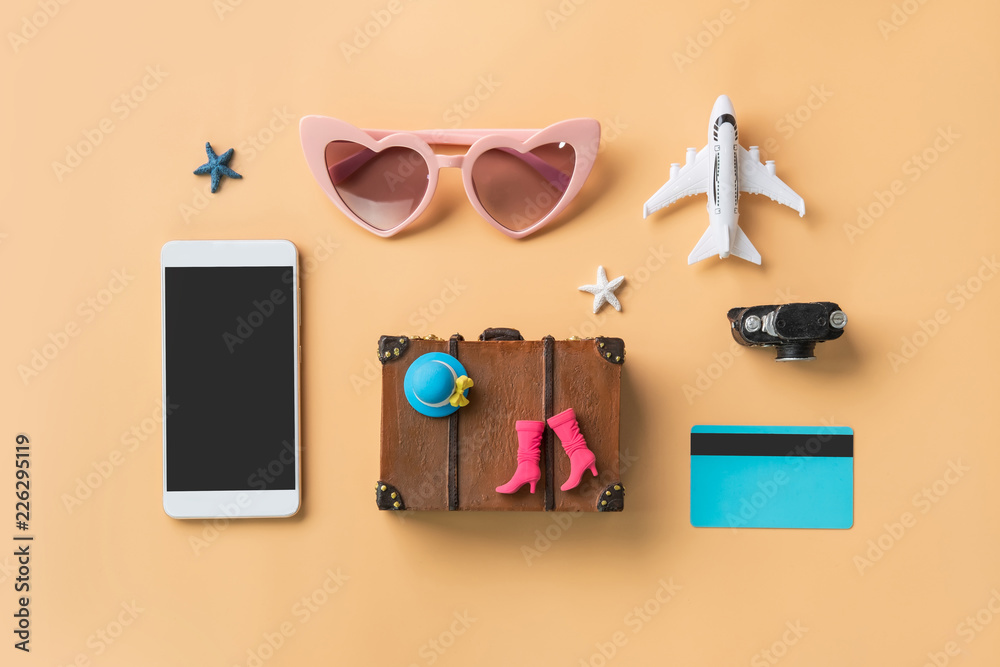 Miniature travel accessories and items with empty screen smart phone and copy space, Travel concept Miniature travel accessories and items with empty screen smart phone and copy space, Travel concept