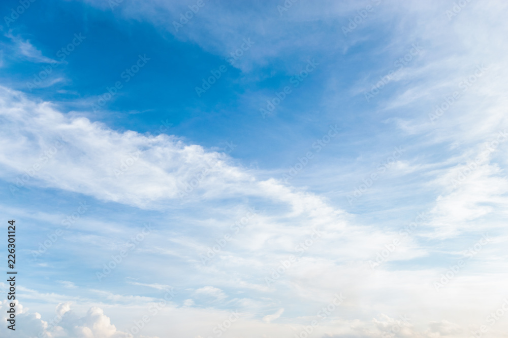 Blue sky with white clouds floating in the sky.