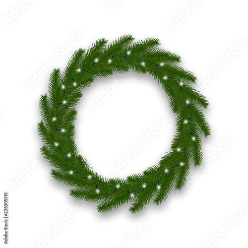 Christmas wreath with lights garland. Fir tree Xmas decoration with lights