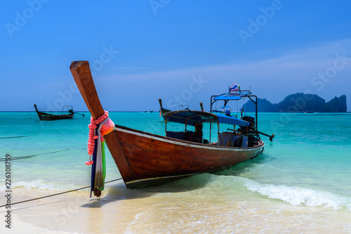 Fototapeta Naklejka Na Ścianę i Meble -  Long tail boats on tropical beach, Phi Phi Don island, Andaman s