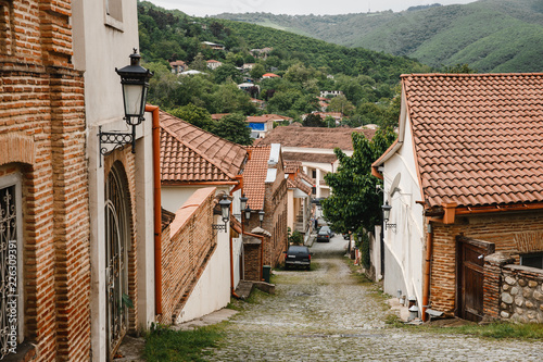 Sighnaghi, Kakheti, Georgia - May 13, 2018: Street in medieval town Sighnaghi. Sighnaghi or Signagi is a heart of Georgia's wine-growing regions. Also known as city of Love photo