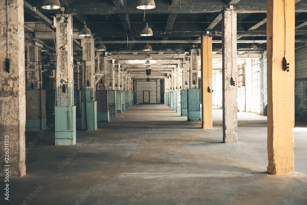 Empty manufactory. Laconic colorful photo of an old forgotten manufactory without people in it