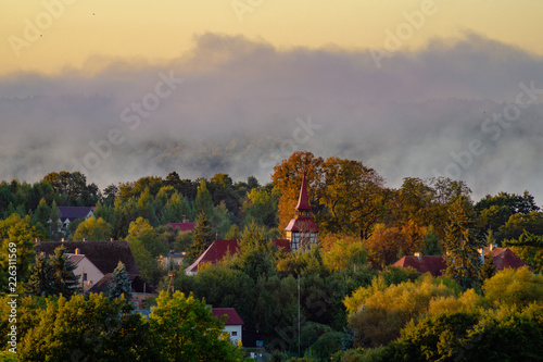 panorama of a village shrouded morning's fog-Poland,Drawsko Lake District