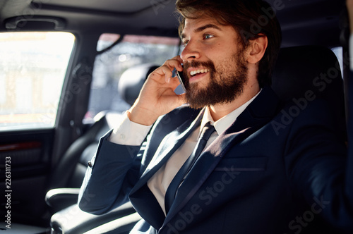business man in the car talking on the phone © SHOTPRIME STUDIO
