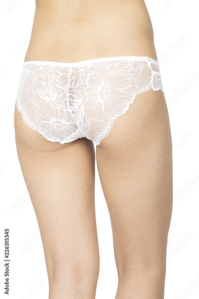 Chinese woman posing in white panties isolated on white background Chinese woman posing in white panties isolated on white background