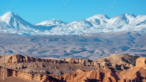 Moon valley in Atacama desert, snowy Andes moutain in the background. Video HD