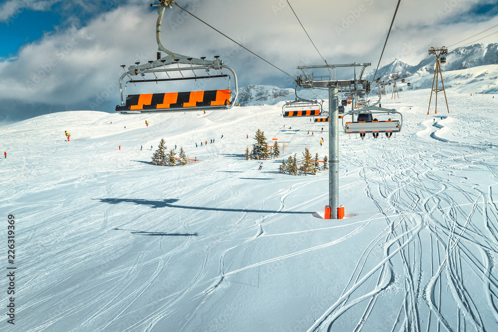 Famous ski slopes with cable cars in French Alpes, Europe Famous ski slopes with cable cars in French Alpes, Europe