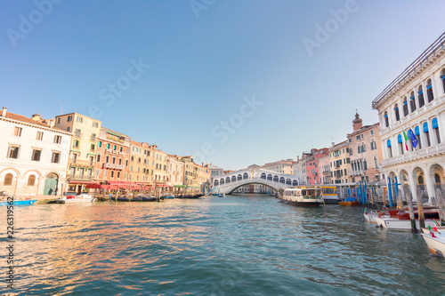 view of famouse Rialto bridge and Grand Canal at summer day, Venice, Italy