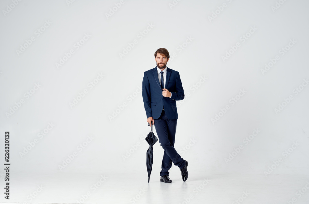 the man leaned his hand on a closed umbrella the man leaned his hand on a closed umbrella